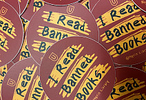 Round stickers stating, I Read Banned Books.