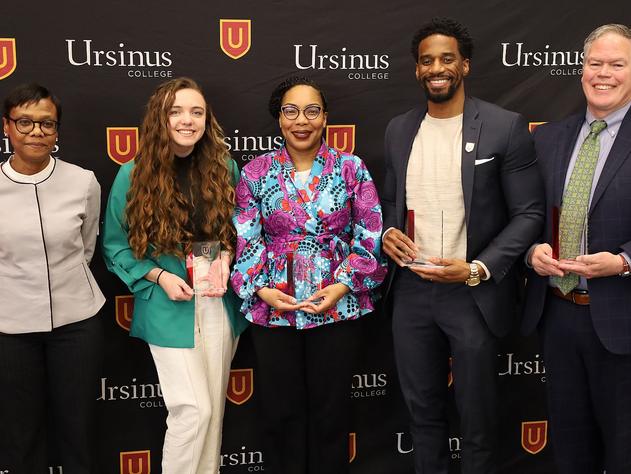 Photo showing Vice President for Inclusion, Heather Lobban-Viravong with the 2024 Recipients of the Ursinus Beloved Community Awards at the