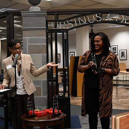 Jennifer King receives the Inclusion and Equity Award from Heather Lobban-Viravong.