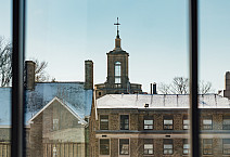 Students walk around a snow-covered campus during their first week back in 2025.
