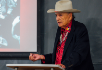 Elder John Thomas sharing a presentation on Boarding School to Activist to Elder