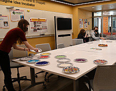 Christine Heren '22 leads a bracelet-crafting workshop to support Ukraine.
