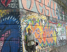 Visiting Instructor of Anthropology Katharine Davis standing at Graffiti Pier in Philadelphia.