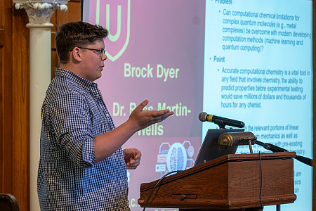 Brock Dyer presents his Summer Fellows research in Bomberger Hall.