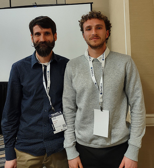 Assistant Professor of French Andrew Jones and French major Joshua Coster '25 at NeMLA 2025