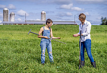 Dr. Denise Finney and undergraduate researcher, Madi Moses, examine a soil sample collected from the forage crop diversity experiment at ...
