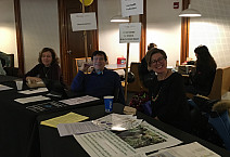 Drs. Dawley, Dawley, and Lyczak welcome students at the Major/Minor expo.
