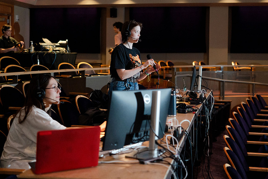 Student Lighting Designers Sophia Bush ('26) and Annie Zulick ('25) at work on the Spring UCDC Concert