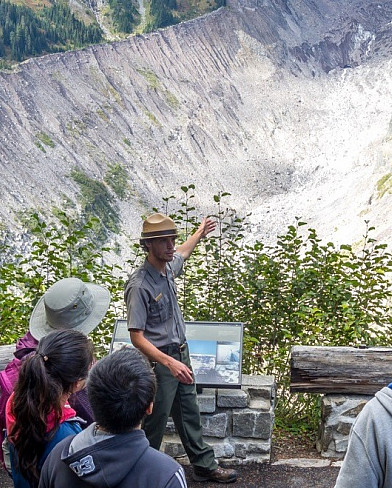 Photo of Amos Almy working in a national park