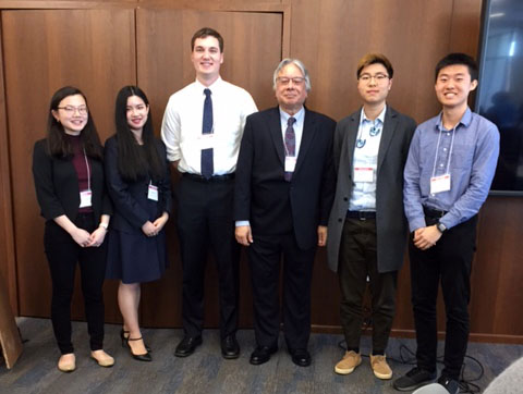 Garrett Bullock (3rd from left) standing with the other GPASC 2019 paper award recipients.