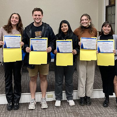 Photo of a group of students holding their Aclamo certifications.