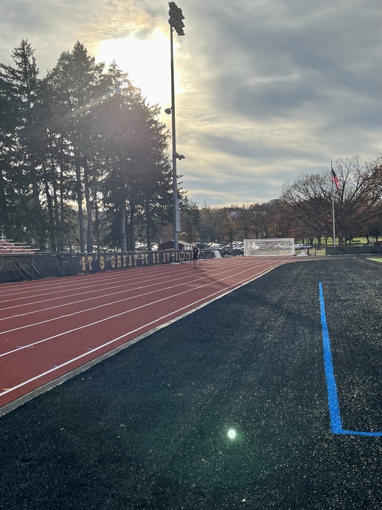 Capturing track and field stand-out Aidan Tobin '26 as he goes the distance for filming.