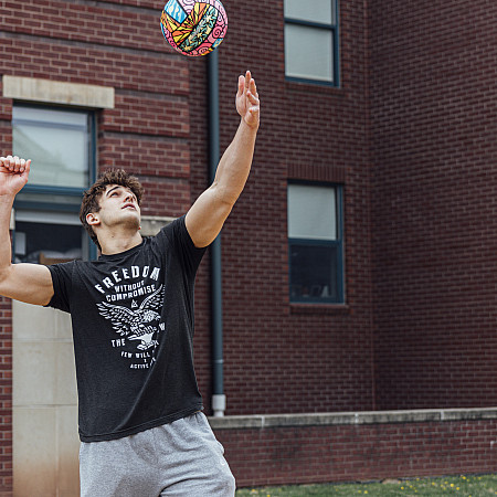 Students play volleyball at Paisley Beach - April 10, 2024