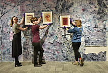 Students in a museum studies course curate an exhibition in 2017.