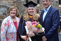 Sara Vukas and family posing at Ursinus College Commencement
