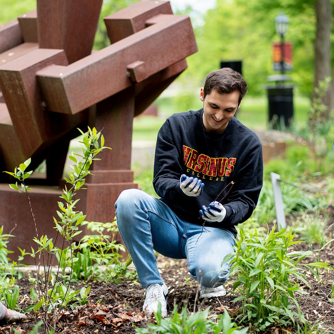 Environmental students outside planting.