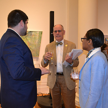 Dean Mark Schneider speaks at an event.