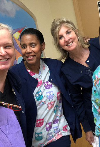 Andrea Cando and Pediatric Dental Employees