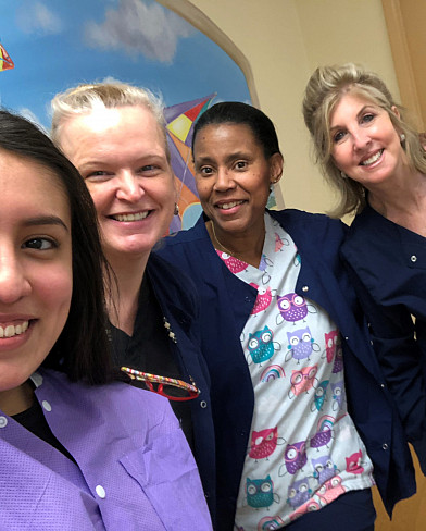 Andrea Cando and Pediatric Dental Employees