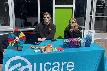 Photo of UCARE Fellows Cole Grubbs '25 & Kate Rubinkam '26 kicking off Spring voter registration